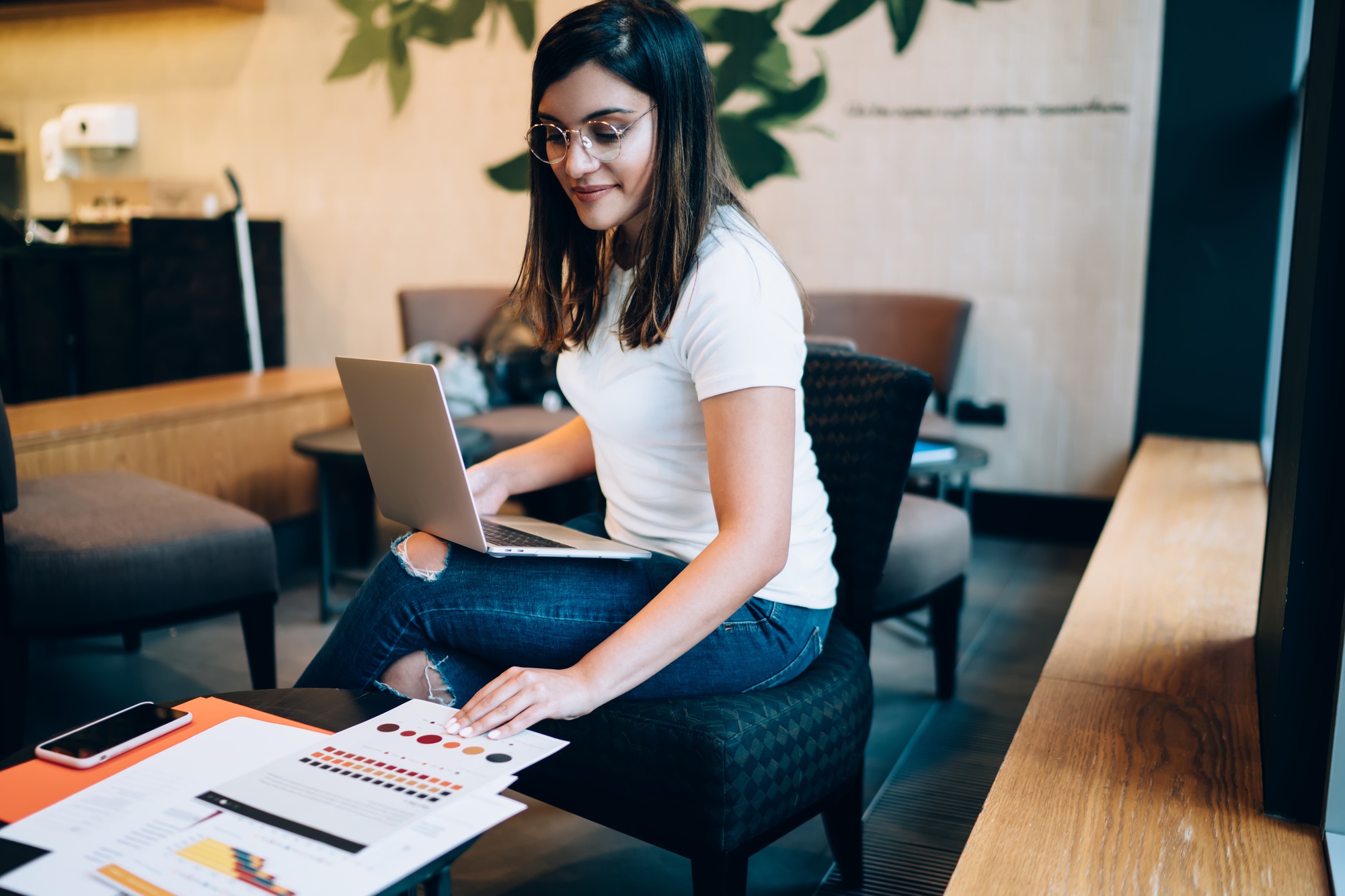 Young woman working on web design